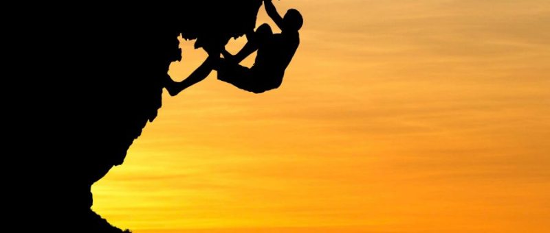 climber-under-rock_0